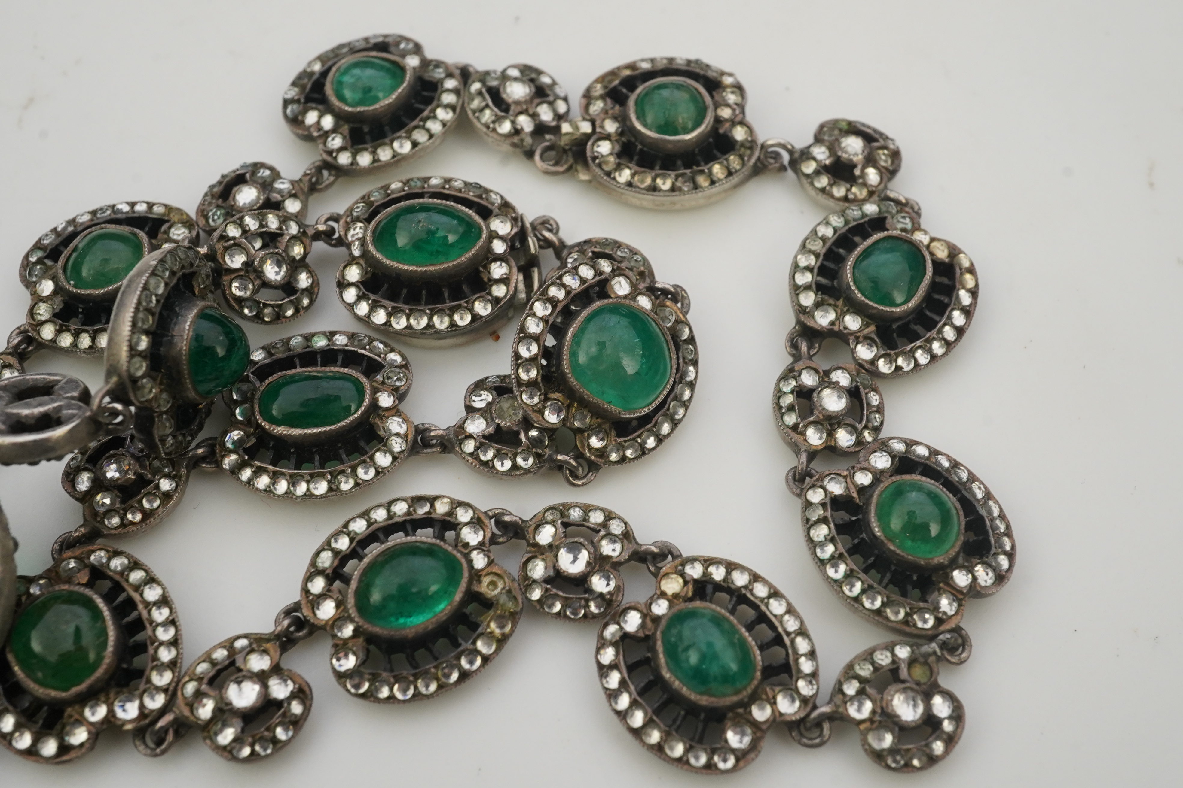 An emerald and rock crystal demi-parure, France, early 20th century